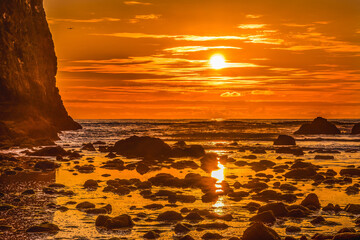 Poster - Colorful sunset, Low tide, Haystack Rock, Canon Beach, Clatsop County, Oregon.