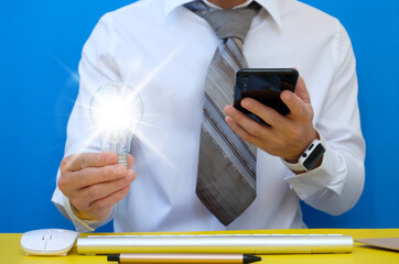 Poster - Businessman using his smartphone to send a text message 