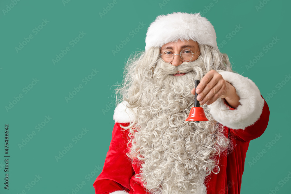 Santa Claus with Christmas bell on green background