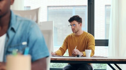 Fototapete - Video of two concentrated graphic designer working with computer in modern startup office.