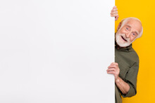 Photo Of Impressed Elder Grey Hairdo Man Look Camera Wear Khaki Outfit Isolated On Yellow Color Background