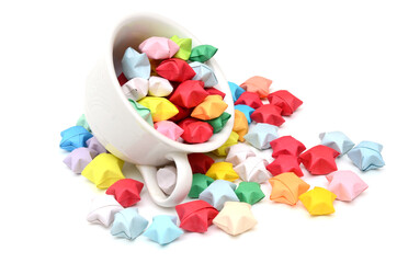 Wall Mural - Origami lucky stars spilling out of cup