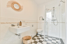 Interior Of White Bathroom With Shower And Bathtub