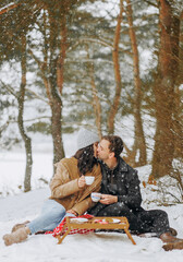 Love story in the winter forest. Valentine's Day concept