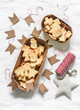 Christmas mood. Christmas shortbread cookies and decorations on a light background, top view