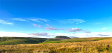 Sunset, Over The Moors And Fields, With The Pen-y-ghent Peak, Set Against A Deep Blue Sky Near, Settle, Yorkshire, UK