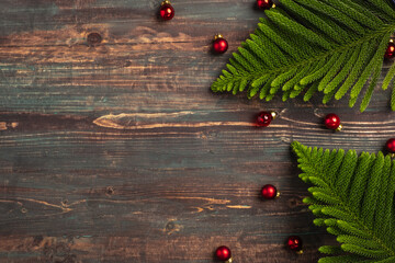 Aufkleber - Christmas pine leaf with bauble decoration on wooden table