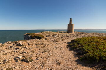 Sticker - Lighthouse on the cliff during sunrise