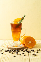 Wall Mural - black coffee with orange and lemon juice