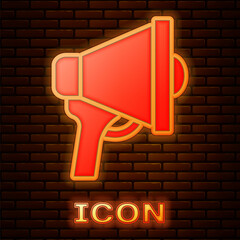 Sticker - Glowing neon Megaphone icon isolated on brick wall background. Speaker sign. Vector