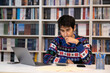 © bahadirbermekphoto - Young businessman working in office worker in christmas sweater