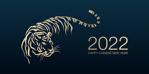 Happy Chinese New Year 2022 by gold brush stroke abstract paint of the tiger isolated on dark blue background.