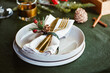© Edalin - Festive table setting with winter decor. The concept of Thanksgiving or Christmas family dinner.