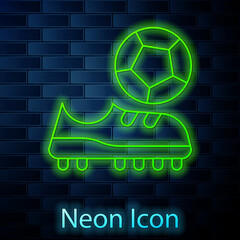 Wall Mural - Glowing neon line Football shoes icon isolated on brick wall background. Soccer boots. Sport football foot protection. Vector