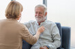 © JU.STOCKER - Selective focus of Female professional doctor hand hold stethoscope exam senior adult man patient, Elderly medical health care concepts