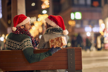 Wall Mural - Couple outdoor in winter.man and woman sharing love.