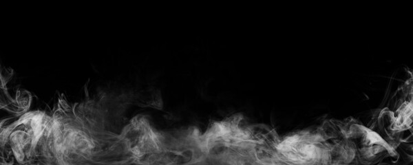 Wall Mural - Panoramic view of the abstract fog. White cloudiness, mist or smog moves on black background. Beautiful swirling gray smoke. Mockup for your logo. Wide angle horizontal wallpaper or web banner.