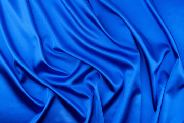 Sticker - Blue satin or silk fabric as background