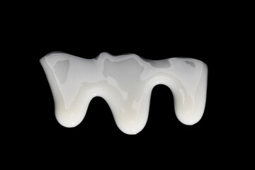 Poster - drops of white glaze isolated on black background