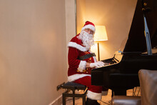 Santa Claus Playing A Piano