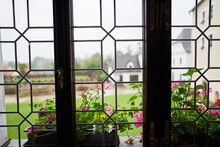 Closeup View From Historic Window  From Medieval Age To The Courtyard Of Quadrangle Of Castle Nove Hrady In Southern Region Of Bohemia In Czech Republic, One Of Most Beautiful Castles From Middle Ages
