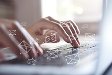 Email Concept. Close Up Of Business Woman Typing On Computer Keyboard With Email Icons On Virtual Screen