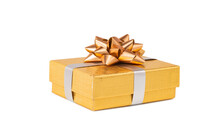 Close Up Shot Of A Golden Gift Box Covered With A Bow Isolated On A White Background