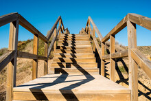 Wooden Stairs To Leave The Beach