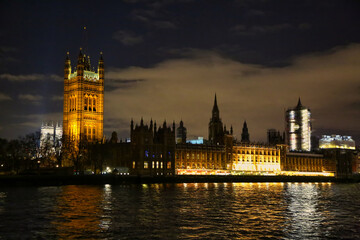 Wall Mural - Illuminated London at night reflecting in the water