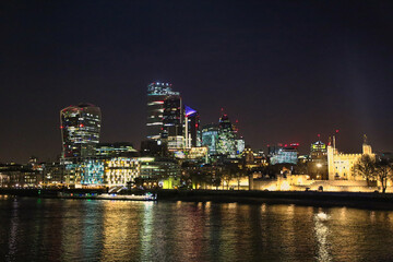 Poster - Illuminated London at night reflecting in the water