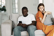 © SHOTPRIME STUDIO - man and woman at home on the couch resentment quarrel