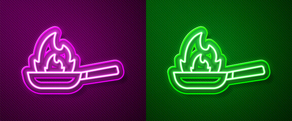 Sticker - Glowing neon line Pan with fire icon isolated on purple and green background. Vector