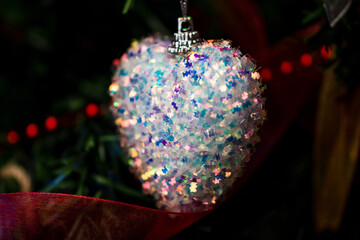 Sticker - Closeup shot of a heart-shape decoration on Christmas tree