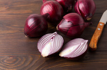 Organic Red Onions On A Wooden Background, Fresh Raw Vegetables.
