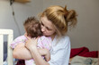 © rubchikova - Young tired woman is holding baby