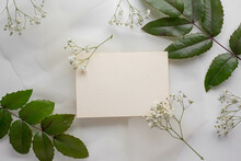 Mockup Card With Plants. Invitation Card With Environment Mockup With Postcard 

Card Mockup With White Flowers And Envelope. Wedding Invitation 