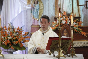 Wall Mural - Priest Celebrating Mass in Easter