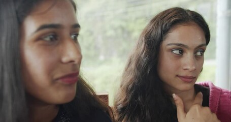 Poster - Two young cheerful Indian friends chatting shot in 4K