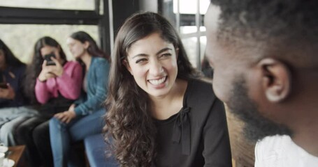 Sticker - A beautiful Indian friends enjoying their time indoors