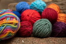 Several Colourful Ball Of Yarns.