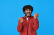 © insta_photos - Excited happy young indian man winner looking at camera showing yes gesture feeling happy about betting lottery win, winning prize, getting new job celebrating victory isolated on blue background.