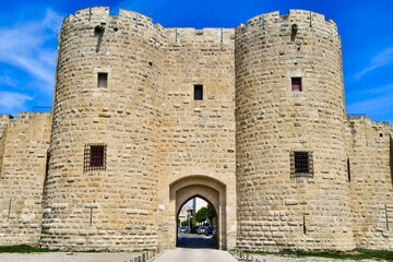 Sticker - Stunning view of the historic Aigues-Mortes City Walls in France under a blue sky