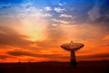 Wall Mural - the silhouette of a radio telescope observatory