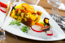 Close Up Of Tasty Tuna Tartare With Mango And Avocado, Served With Fig And Flower