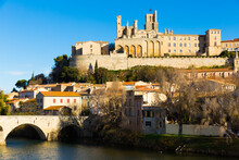 View Of Cathedral Of Saint Nazaire And Old Bridge Across Orb River, Beziers, France