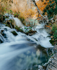 Sticker - Long exposure photo of cascades at famous Plitvice Lakes National Park in Croatia in autumn