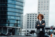 © Westend61 - Businessman with arms crossed at Potsdamer Platz