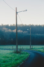 Telephone Poles Along Empty Rural Road