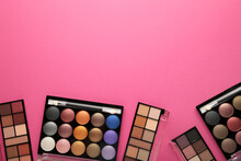 Professional Makeup Palette With Brushes On Pink Background. Make Up Cosmetics