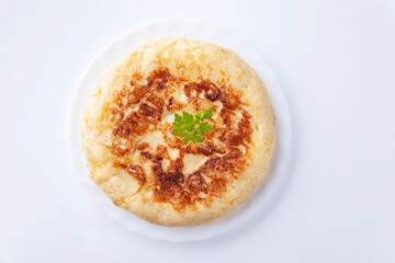 Wall Mural - Spanish potato omelet on white background 